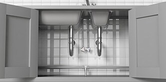 An open view of sink doors exposing the pipes
