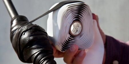 image of 3M mastic being wrapped around irregular electrical connection
