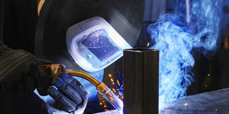 Mig welding with 3M Speedglas welding safety helmet
