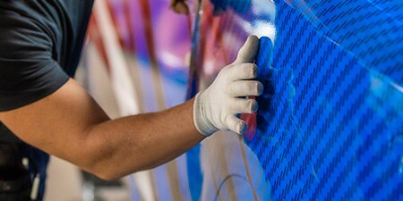 Close up of squeegee air release IJ280 print wrap film

