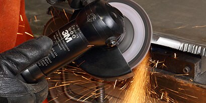 Beveling a metal edge with a flap disc
