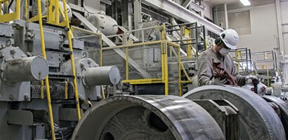 Woman in factory wearing Manufacturing Industry PPE
