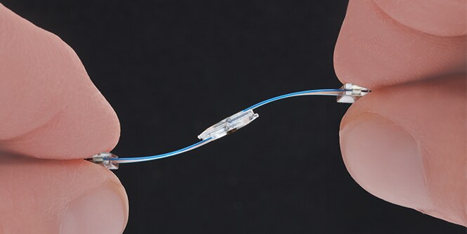 Close-up of the precision parallel fibre optic ferrule alignment.
