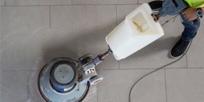 3M floor pads being used to clean a facility
