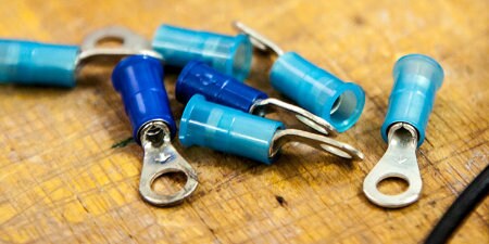 Different types of 3M Ring Terminals on workbench
