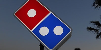 Domino's pizza illuminated sign wrapped in 3M printable, coloured, translucent film
