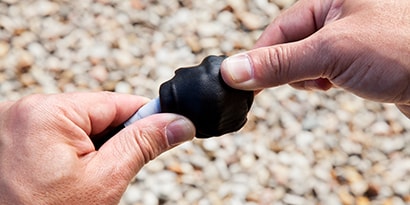 Image of 3M™ Scotchfil™ Electrical Insulation Putty applied over split bolt wrapped with Scotch® Self-Fusing Silicone Rubber Tape 70 HDT.
