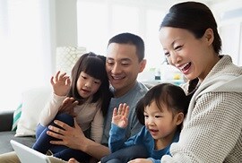 family enjoying cool tempatures while saving energy costs at their home with 3M window film