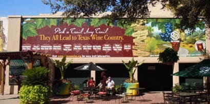 The side of a large building with a wine country graphic informational sign made with 3M graphics and signage products
