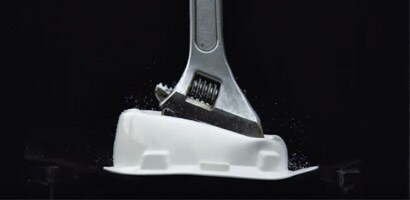 Adjustable wrench deeply embedded in hard hat after falling from height
