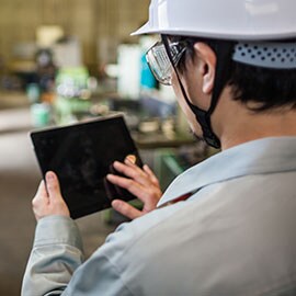 Person using tablet at work location