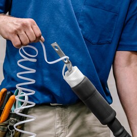 3M Electrician unwinds core from 3M medium voltage termination