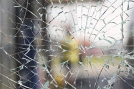 Looking through a window with splintered glass